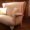 Parker Knoll two seater sofa newly upholstered in Moon & Moon Fabric