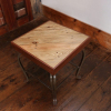 Square side table made from reclaimed pallet wood and decorative steel base