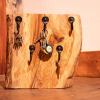 Free standing key holder made from drift wood finished with decorative hooks