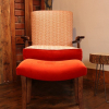 Parker Knoll armchair and footstool in Linwood Orange Tango Weaves and Velvet
