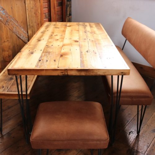 custom made reclaimed wood dining table with industrial bench