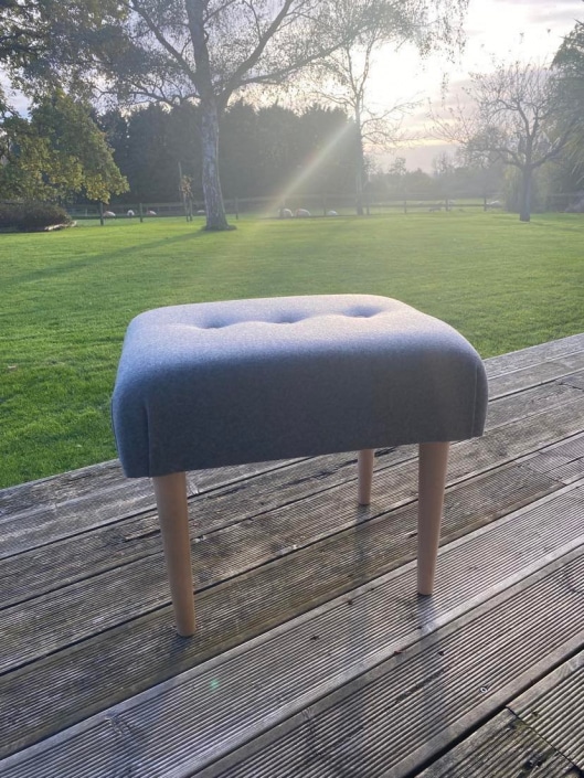 Footstool with buttons