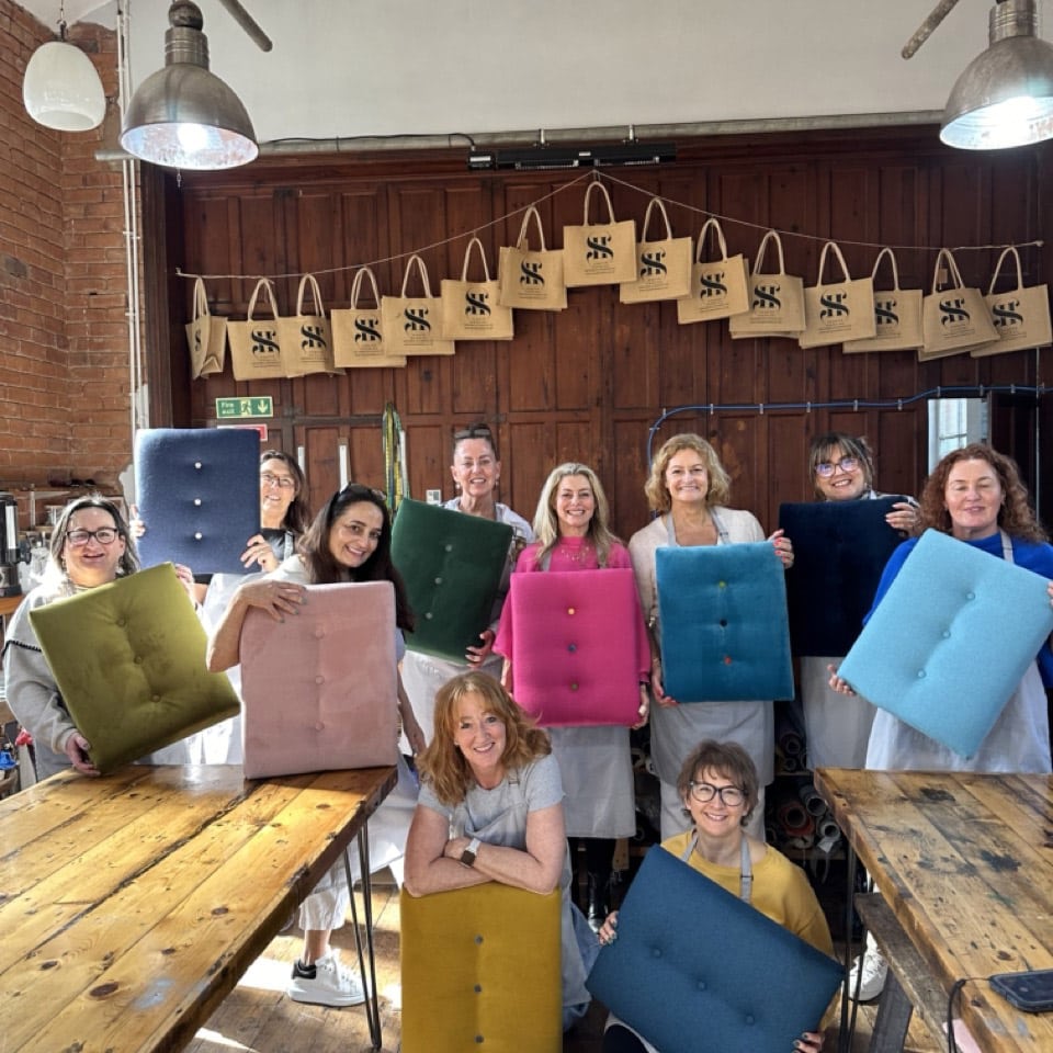 Example of a Upholstered Storage Crate made at a team building workshop