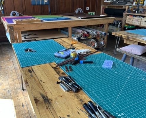 Craft workshops in Cheshire studio space set up for the leather belt making workshop, showing tools, materials, and equipment ready for participants to make your own leather belt.
