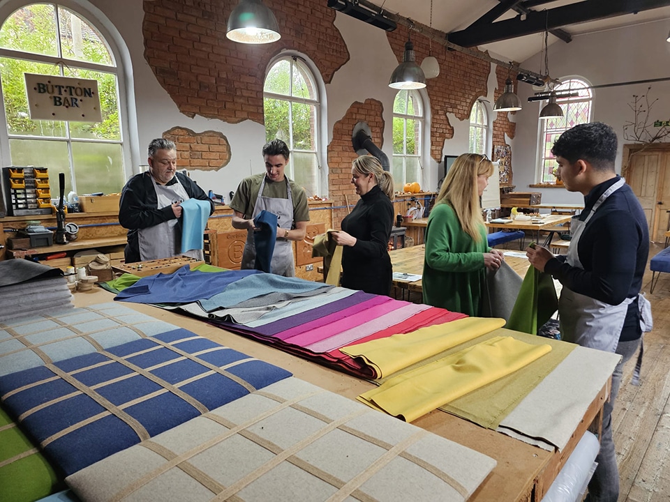 apollo-care-team-strategy-session Apollo Care Franchising team collaborating during their Apollo 2026 strategy session following the creative workshop.