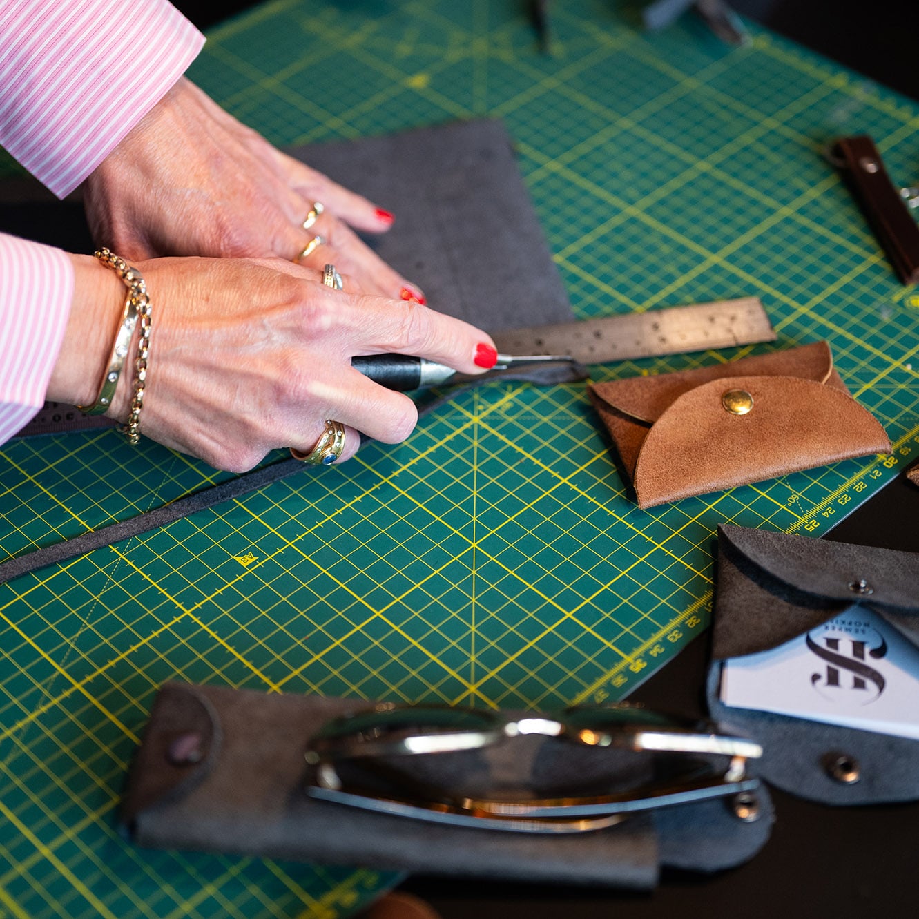 Tools needed for a team building, leather belt making activity