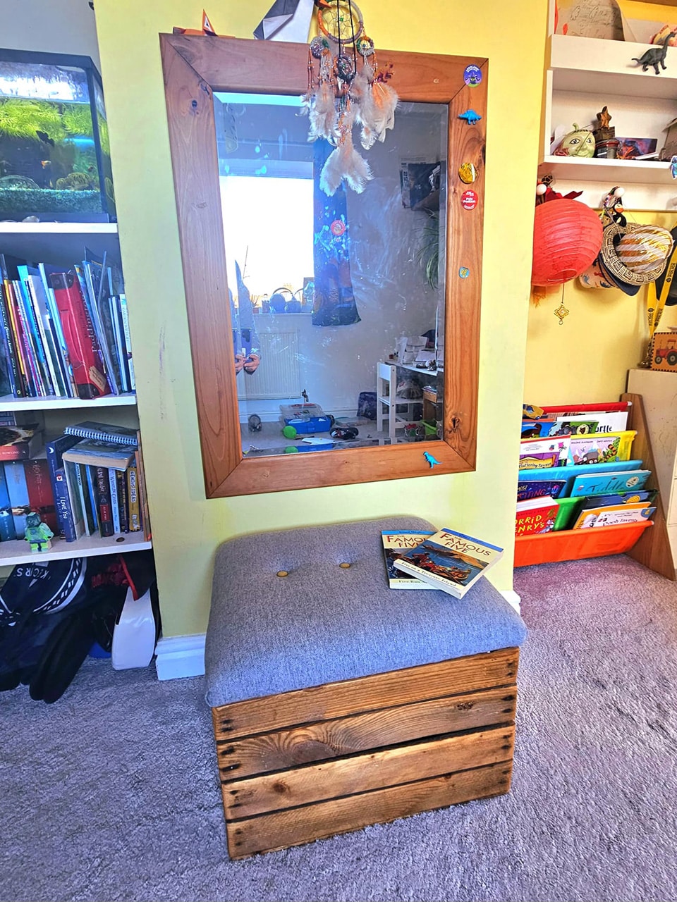 ros-finished-upholstered-crate-in-family-home Ros’s finished upholstered crate in her son’s bedroom, styled as a reading seat with children’s books resting on top.